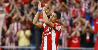 Suárez, ovacionado en su despedida