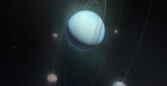 Indicios de océanos activos bajo un par de lunas de Urano