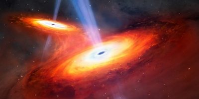 Primer hallazgo de un par de cusares fusionados en el amanecer csmico