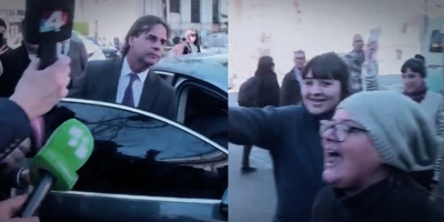 Un grupo de personas escracharon al presidente de la Rep�blica cuando sal�a la inauguraci�n de un laboratorio en la Facultad de Medicina 