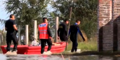 Hallan el cad�ver del argentino que se tir� al r�o para salvar a su esposa