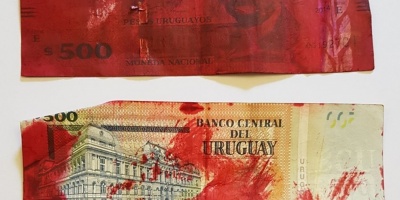 Mensaje de WhatsApp con billete entintado, es falso