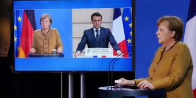Macron y Merkel urgen a subir la producci�n europea de vacunas contra covid