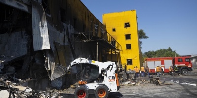 Los bomberos buscan m�s v�ctimas entre las ruinas de centro comercial atacado