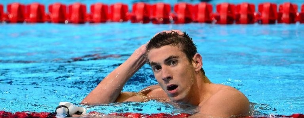 Phelps firma mejor tiempo de 100 m mariposa en su regreso a las piscinas