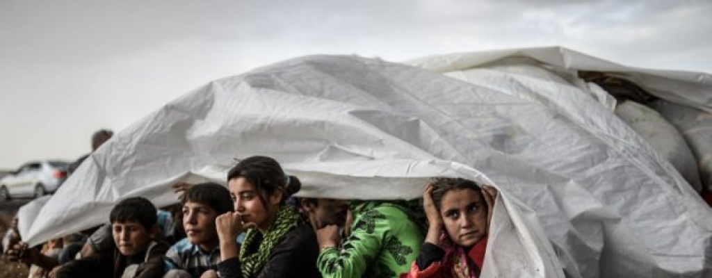 Miles de sirios esperan bajo la lluvia que Turqu�a abra la frontera